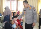 Kapolres Langkat Beri Bantuan Makanan Tambahan Kepada Anak