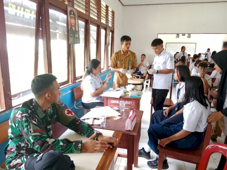 Pos Siding Pamtas RI-Mly Yonarmed 16/TK Melaksanakan Imunisasi Japanese Encephalitis