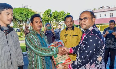 Pj. Walikota Padangsidimpuan Menyerahkan Bantuan Bibit Padi Sawah Gemas El-Nino